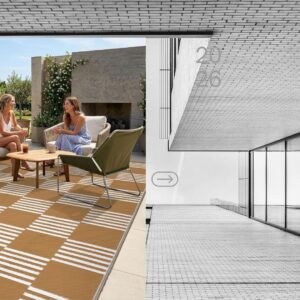 Large tan checkered waterproof outdoor rug on a patio deck beside RV camping chairs and outdoor furniture.