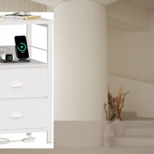 White nightstand with built-in charging station, fabric drawers, open storage shelf, and side hooks placed beside a bed in a modern bedroom.