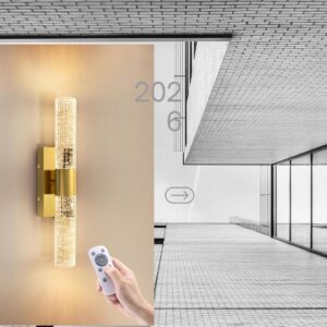 Set of 2 gold battery operated wall sconces with rechargeable LED lights, remote control, dimmable brightness, and wireless modern wall décor for bedroom, bathroom, vanity, and living room.