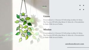 Green stained glass leaf hanging with metal chain used as decorative window sun catcher for modern home decor.