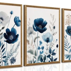 Set of 3 blue floral canvas wall art prints featuring navy blue wildflowers, lilies, and daisies in watercolor botanical designs with wood frames for living room, bedroom, and bathroom décor.
